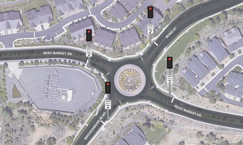 Mock up of Reed Market and Bond/Brookswood Roundabout with traffic signals.