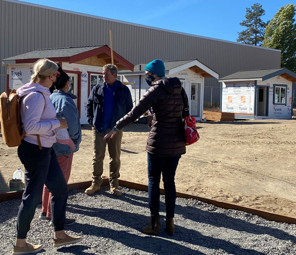 City Councilors touring new vertrans village.