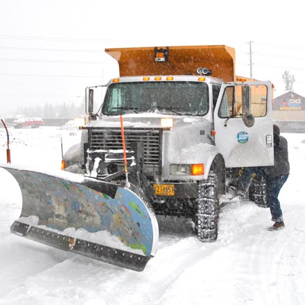 City of Bend snowplow during a snowstorm.