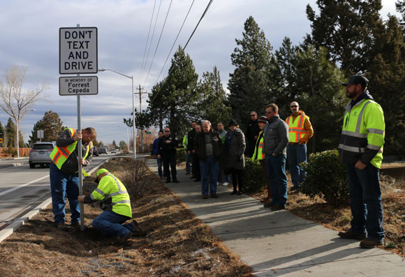 Don't Text and Drive Forrest Cepeda sign installation.