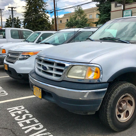 Fleet of parked City vehicles.