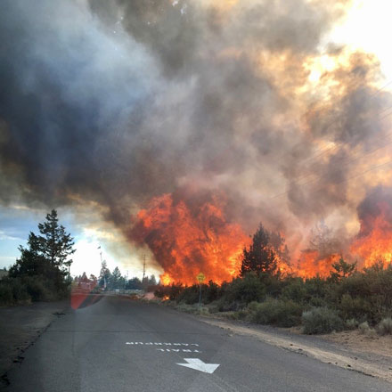 Flames from large fire caused by fireworks.