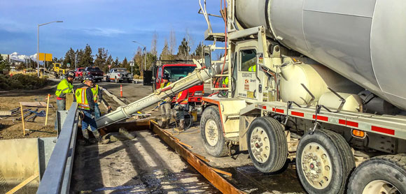 Laying concrete during Empire Boulevard construction.