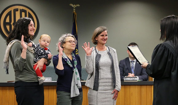 Swearing in of Councilors Gena Goodman-Campbell (with baby June), Barb Campbell, and directly-elected Mayor, Sally Russell.