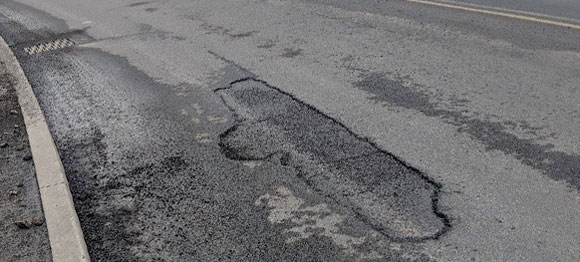 Street surface delamination.