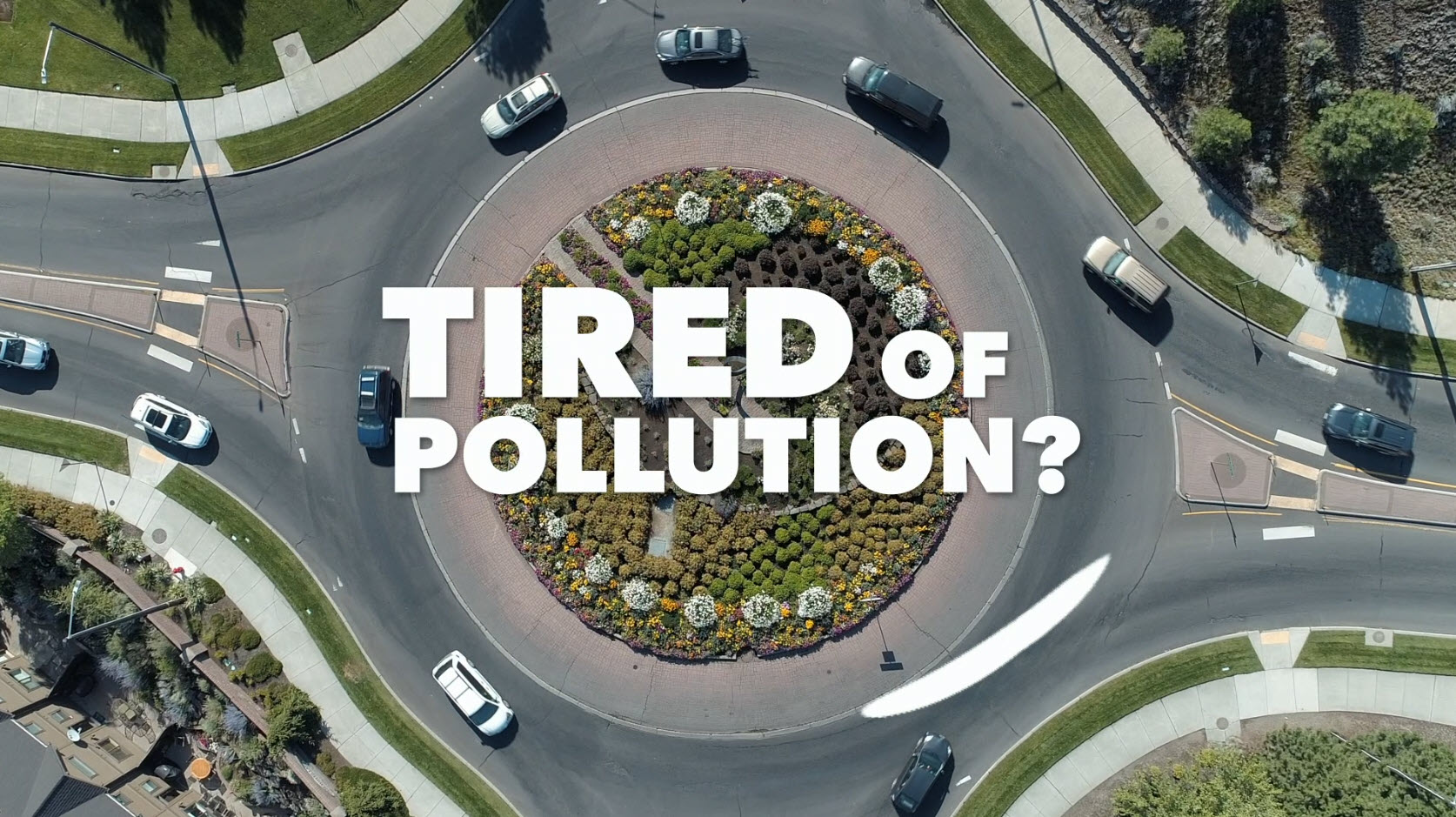 Roundabout with words TIRED of Pollution