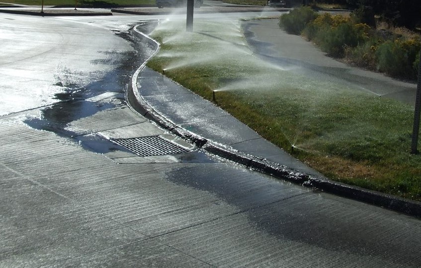 Sprinkler water on street