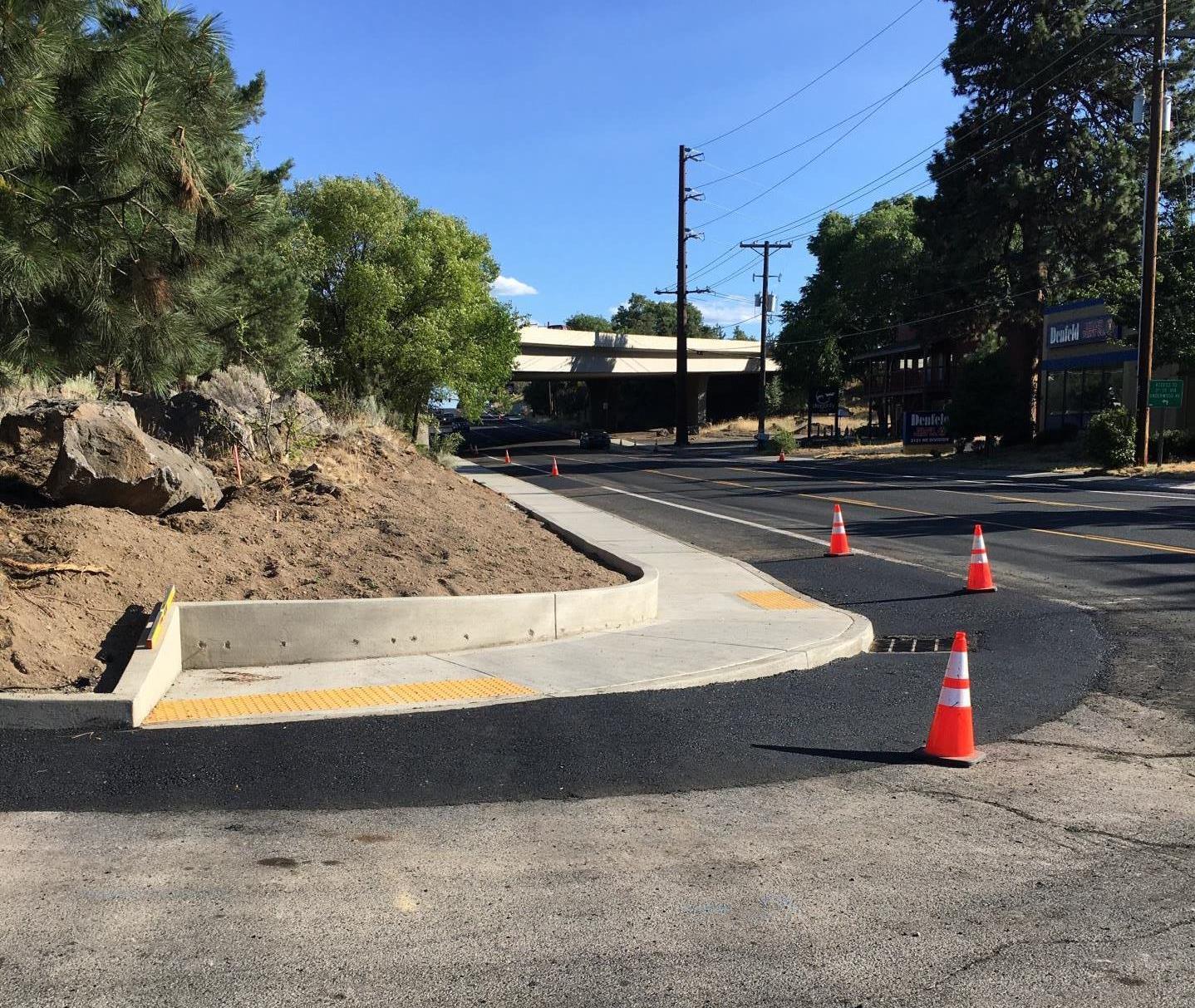 Division Street Photo 1 After – newly constructed curb ramps and long stretch of sidewalk.