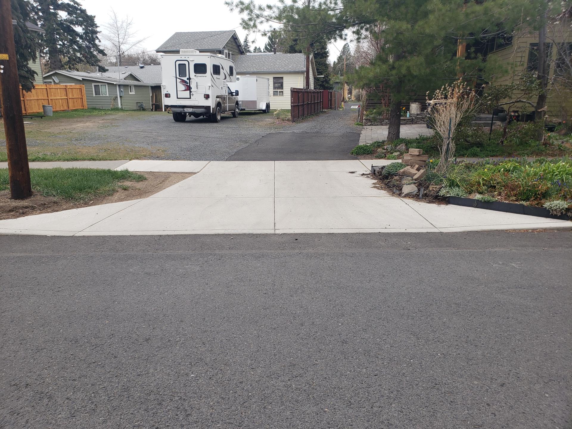 Riverside alley – reconstructed alley from gravel to concrete and asphalt, one of three on the street.