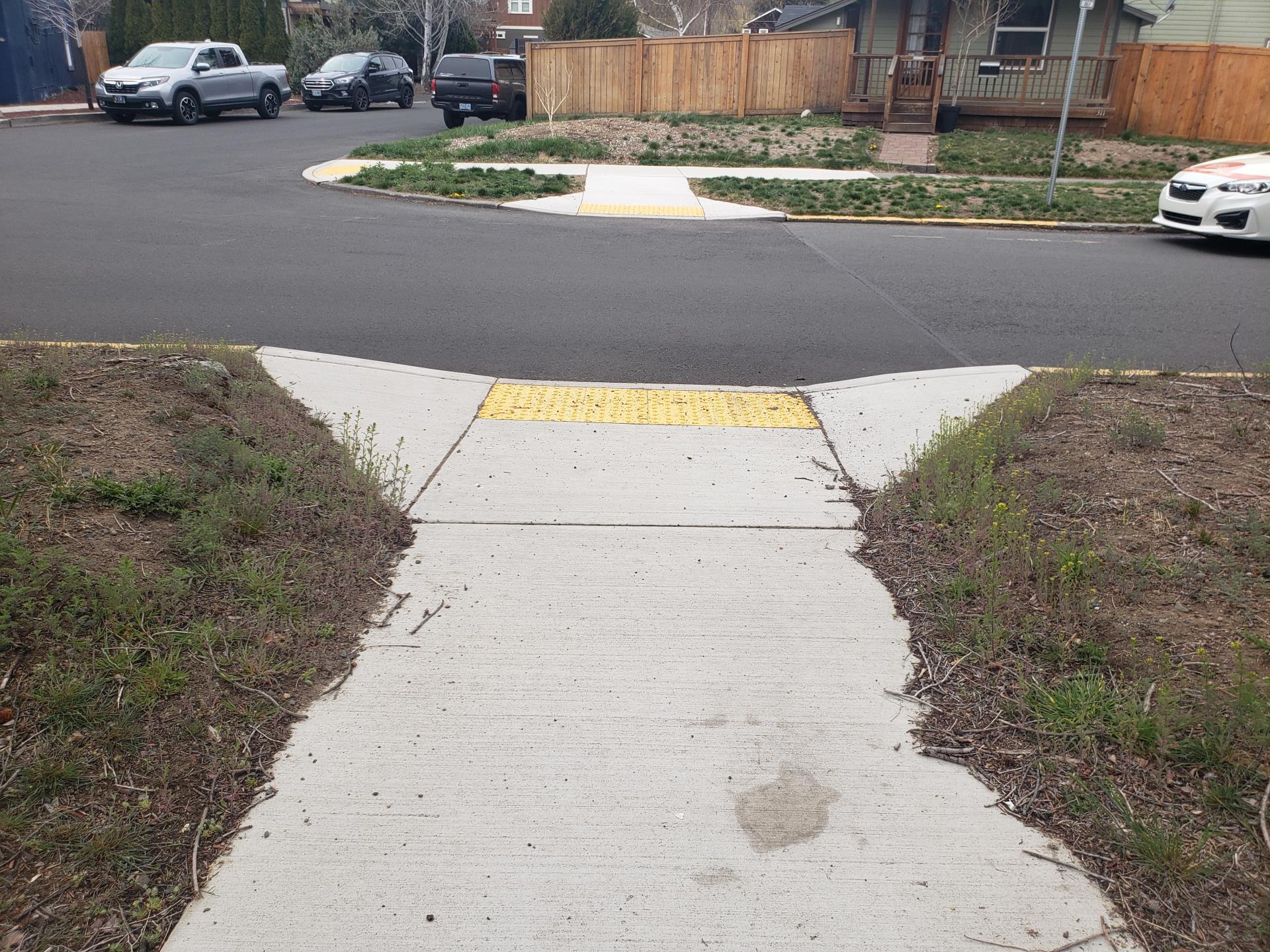 Riverside and McCann – newly constructed curb ramps at intersection.