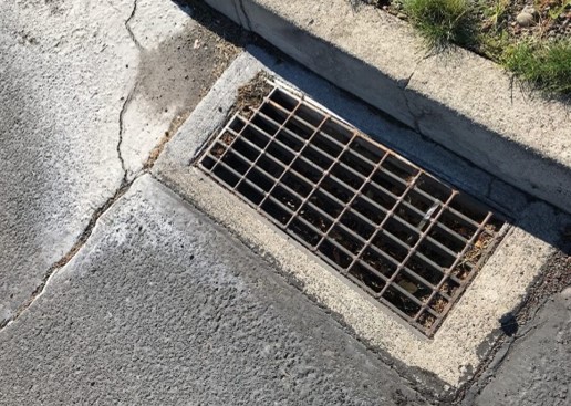 storm drain  on side of street