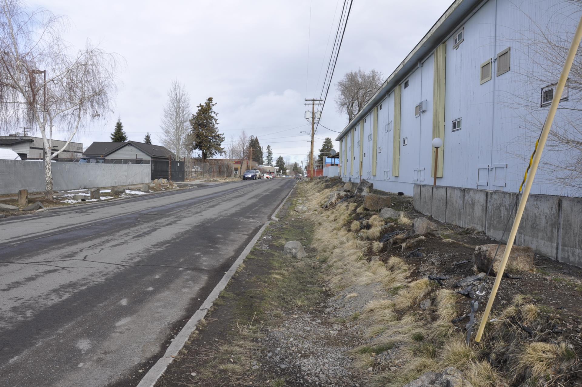 East side of Second Street facing north shows no sidewalk on east side of street