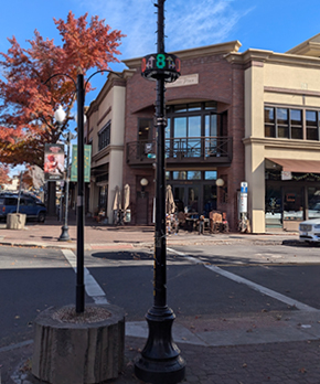 Image of a lightpole in Downtown Bend with a CIRC Parking Display attached to it