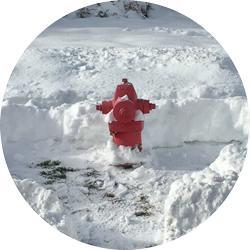 Fire hydrant that has had the snow shoveled out from around it