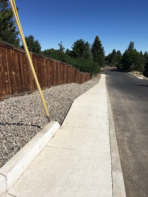 Shepard Rd After Photo 3 After - long stretch of newly constructed sidewalk.