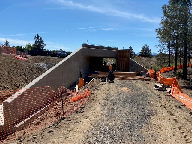 A photo of work crews working on the Empire Crossing pedestrian undercrossing.