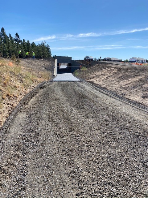 A photo of the recently paved Empire pedestrian/bicycle undercrossing.