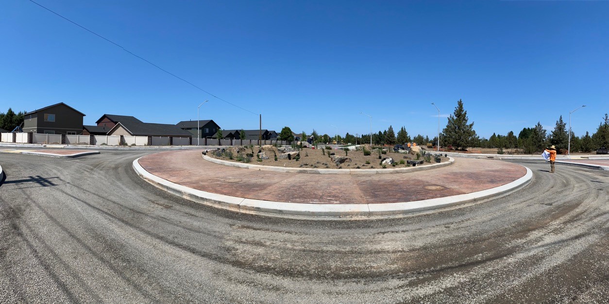 A photo of the Butler Market Road & Deschutes Market roundabout.