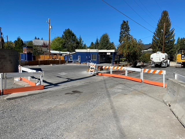 A photo of barricades set up to close of work zones and keeping access to Active Culture open during construction.