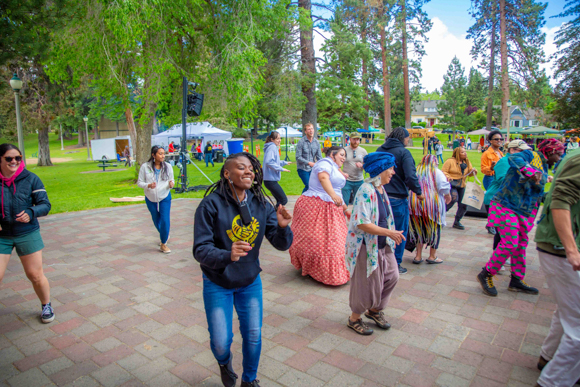People dancing at a Juneteenth celebration.