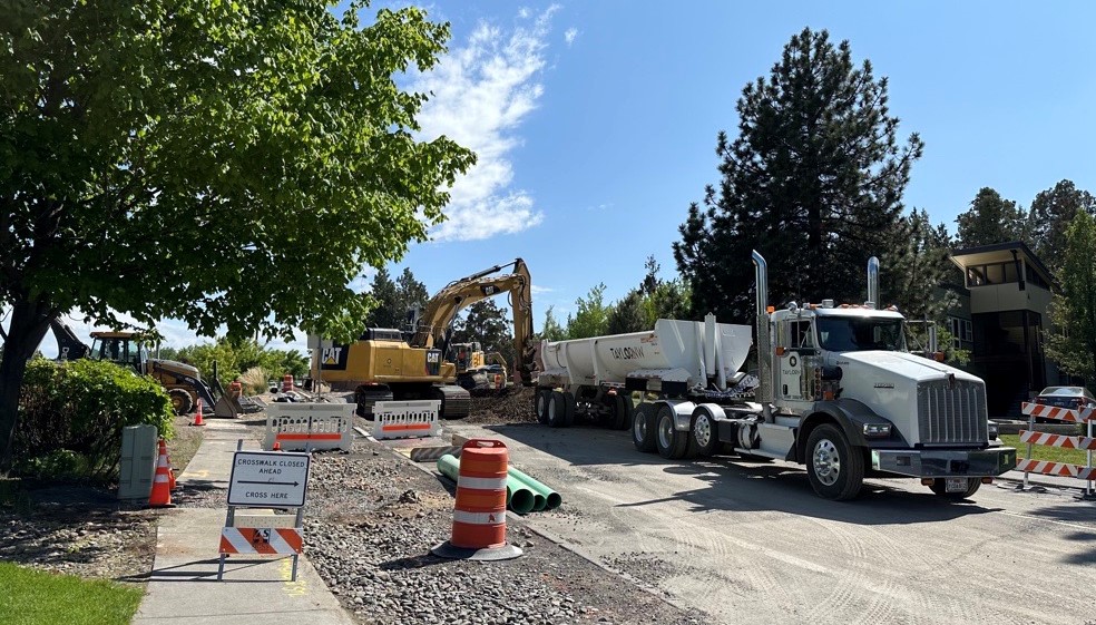 Neff and Purcell construction with heavy equipment and dump truck