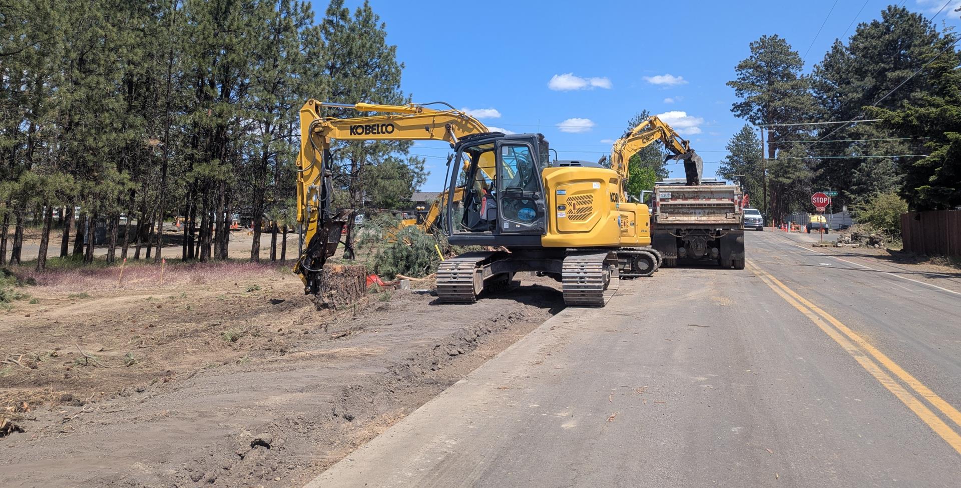 Construction equipment working in roadway