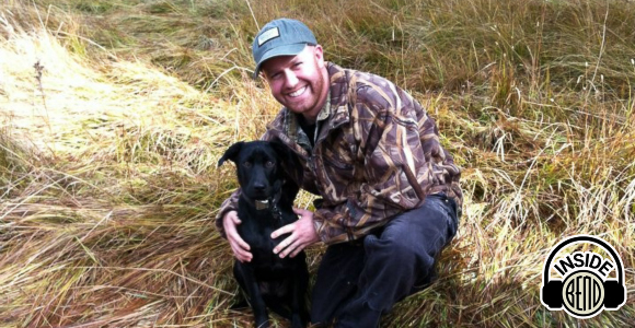 Information Security Manager Adam Young with his black dog