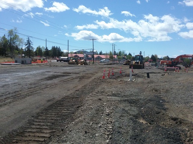 A photo of work crews and equipment working on 27th Street and Butler Market Road roundabout road construction.