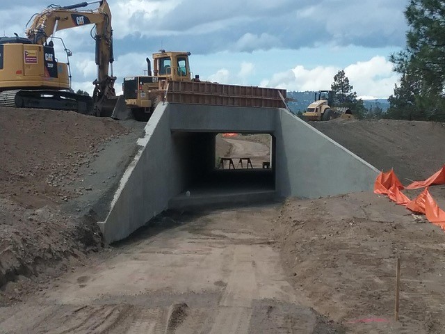 A photo of construction equipment above the Empire pedestrian and bicycle undercrossing, which is nearing completion.