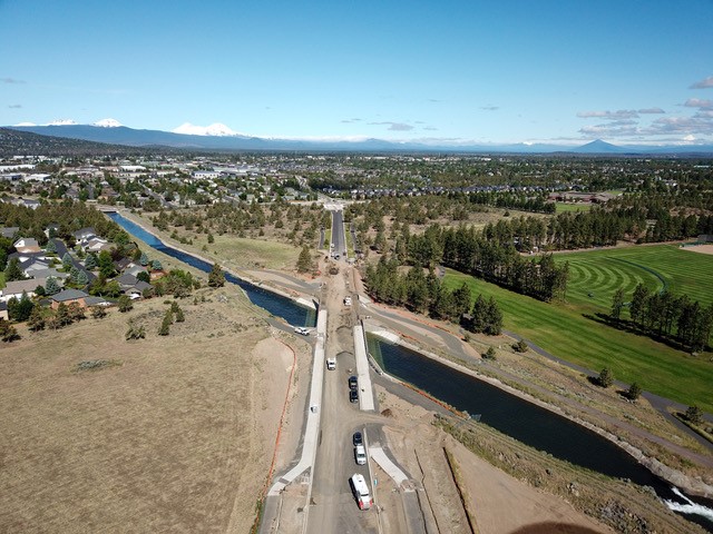 An aerial bird's-eye view of the Empire crossing structure over the North Unit Irrigation Canal and the Empire bike/pedestrian undercrossing.