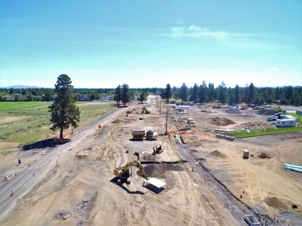 An aerial bird's-eye view looking east over the utility work along Brosterhous.