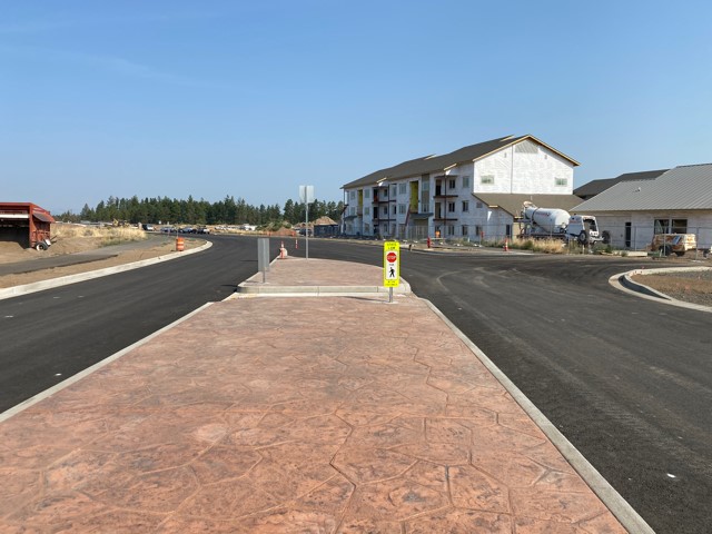 A photo of the Empire extension standing from the center median, near the Butler Market Road & 27th Street roundabout.