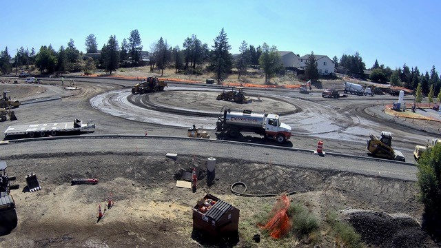 A photo of work crews and equipment working on construction of the Butler Market Road & 27th Street roundabout.