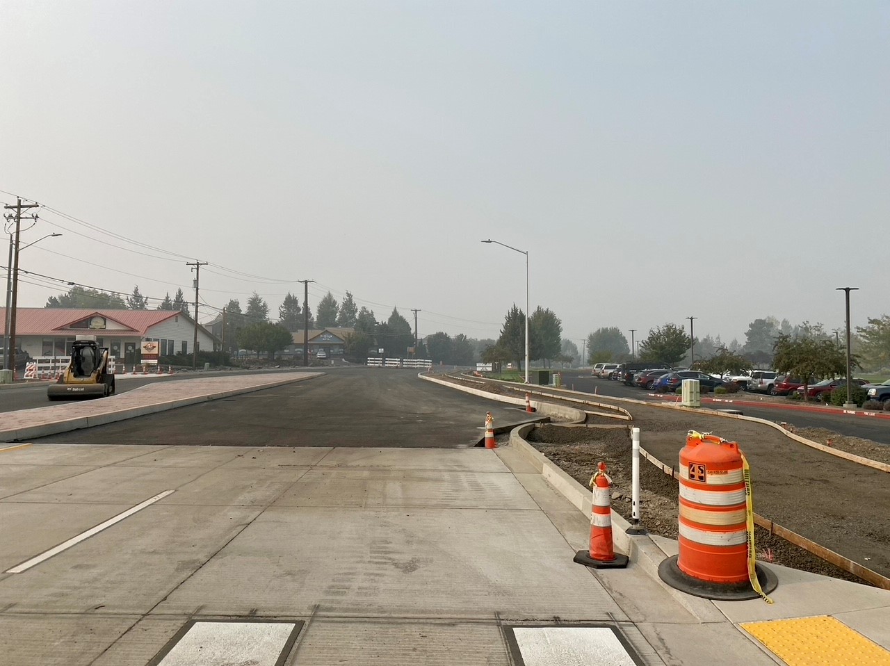 A photo capturing the smokey air conditions looking from the west leg of the 27th & Butler Market Road roundabout.