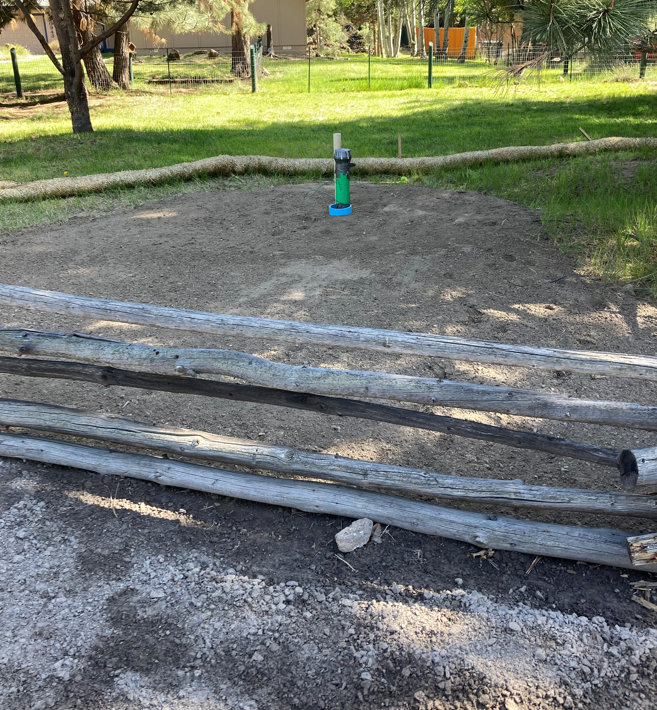 A photo of a completed sewer service lateral before it's cut and capped to surface grade.