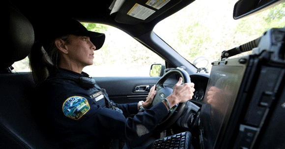 A Bend Police officer in the car.