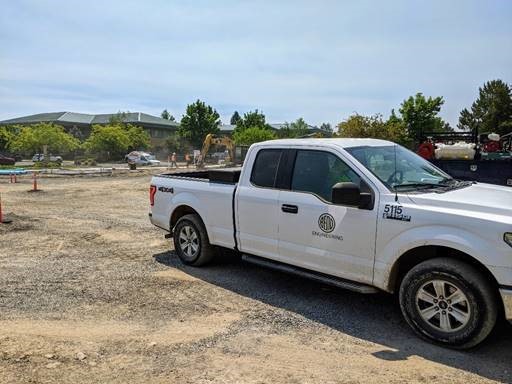 A photo of City of Bend Engineers on site inspecting improvements.