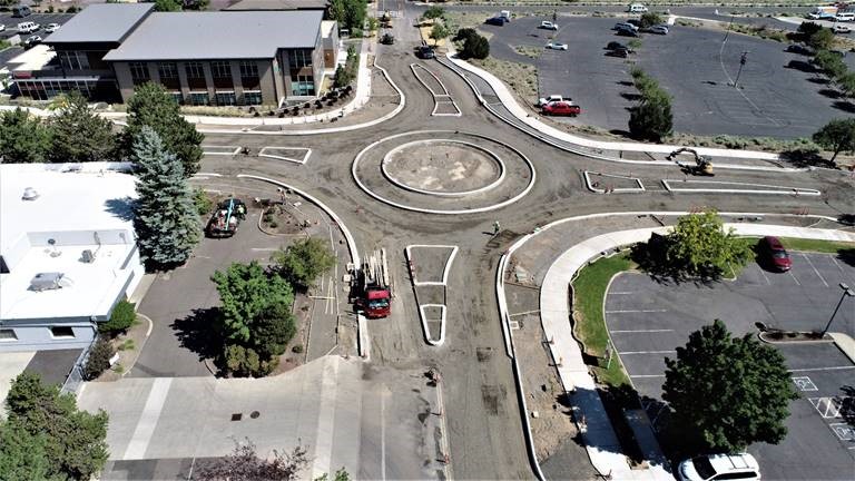 An aerial photo facing north and overlooking the roundabout construction work on Columbia Blvd.