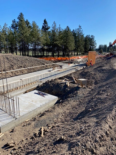 A photo of work crews working on the Empire Crossing Structure pedestrian undercrossing construction site.