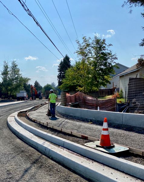 A photo of NE Butler Market Rd. facing west at the intersection of NE Purcell Blvd.