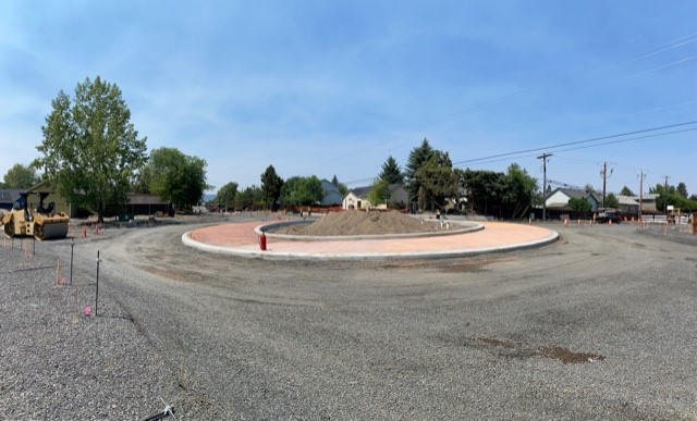 A photo of the new roundabout at NE Purcell Blvd and NE Butler Market Rd.