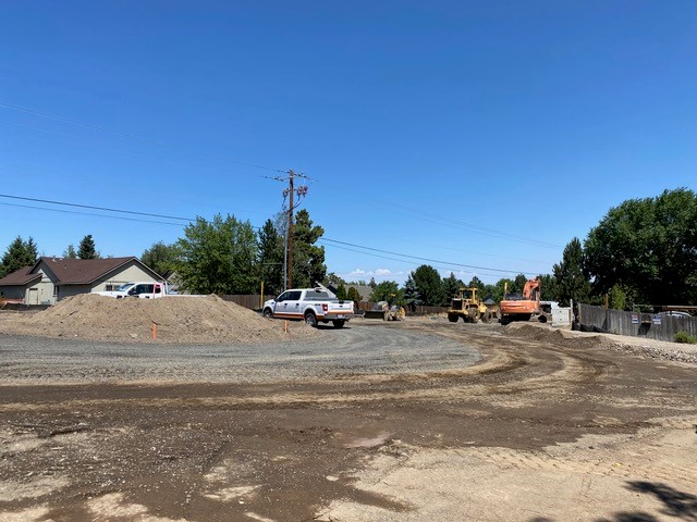 A photo of the working crew and equipment prepping NE Butler Market Rd. for curbing and sidewalks.