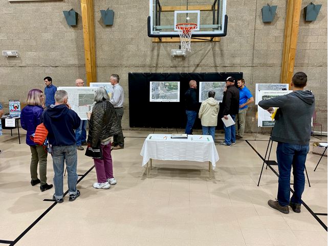 A photo of Empire Corridor Project members meeting with local residents at the 2019 Mountain View Neighborhood Association Meeting.