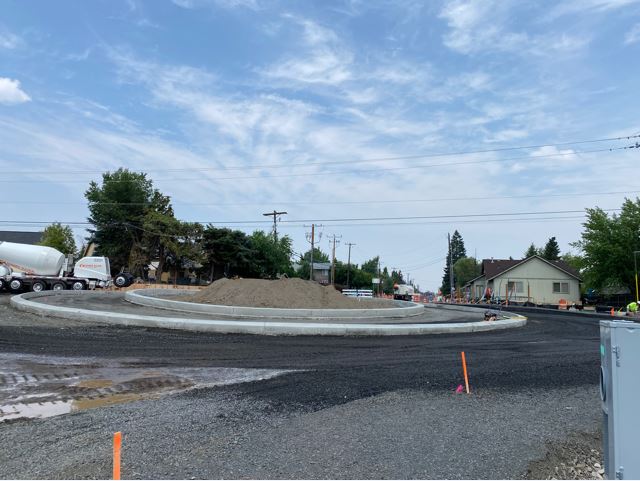 A photo of the NE Purcell Blvd and Butler Market Road roundabout facing north.