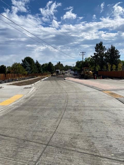 A photo facing east as work continues along NE Butler Market Rd.