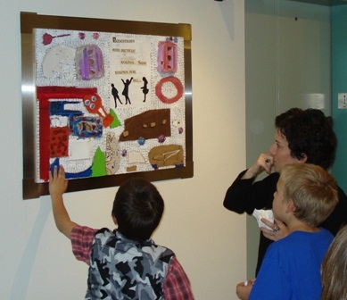 Children looking at artwork