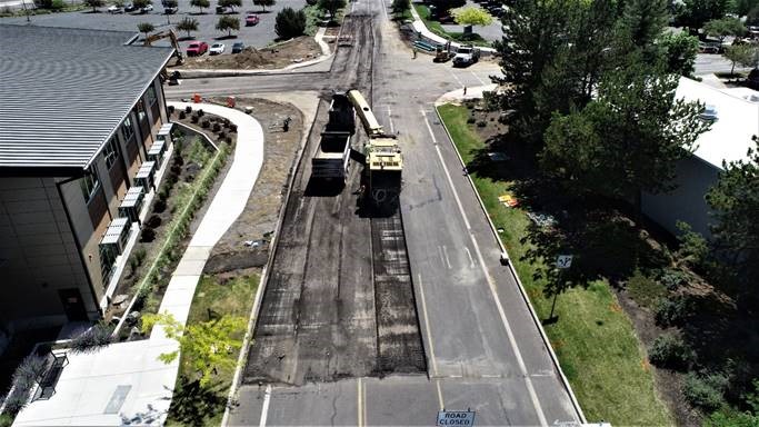 An aerial photo looking south as work crews remove the existing pavement on Simpson Ave.