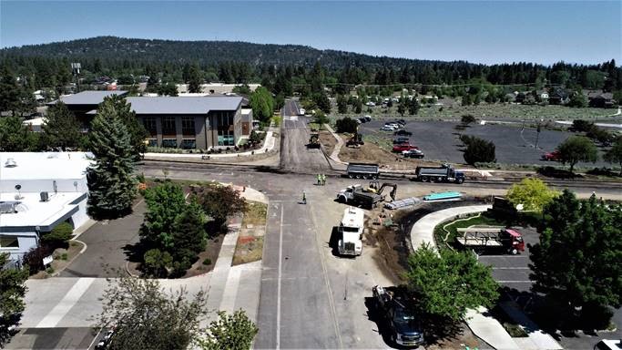 An aerial photo looking north as work crews are prepping new stormwater pipe.