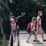 Kids crossing the street on their way to school.