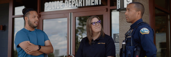 Group standing in front of the Bend Police Department.